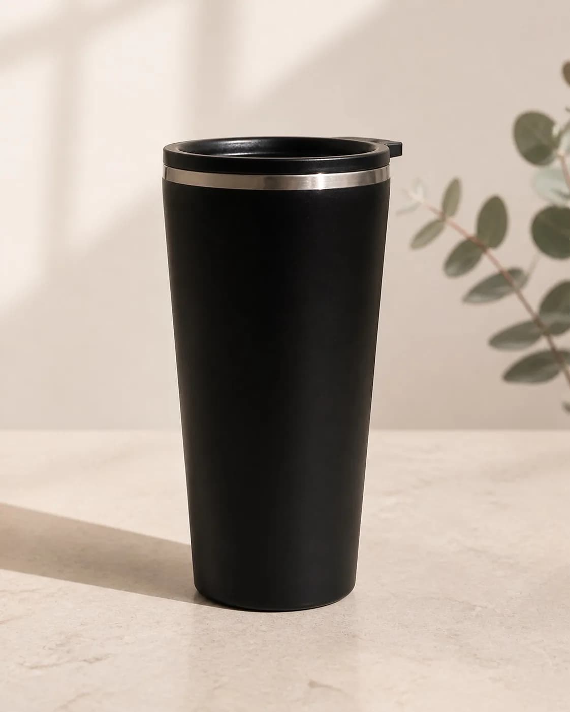 After: a refined, text-free studio product photograph of an insulated tumbler